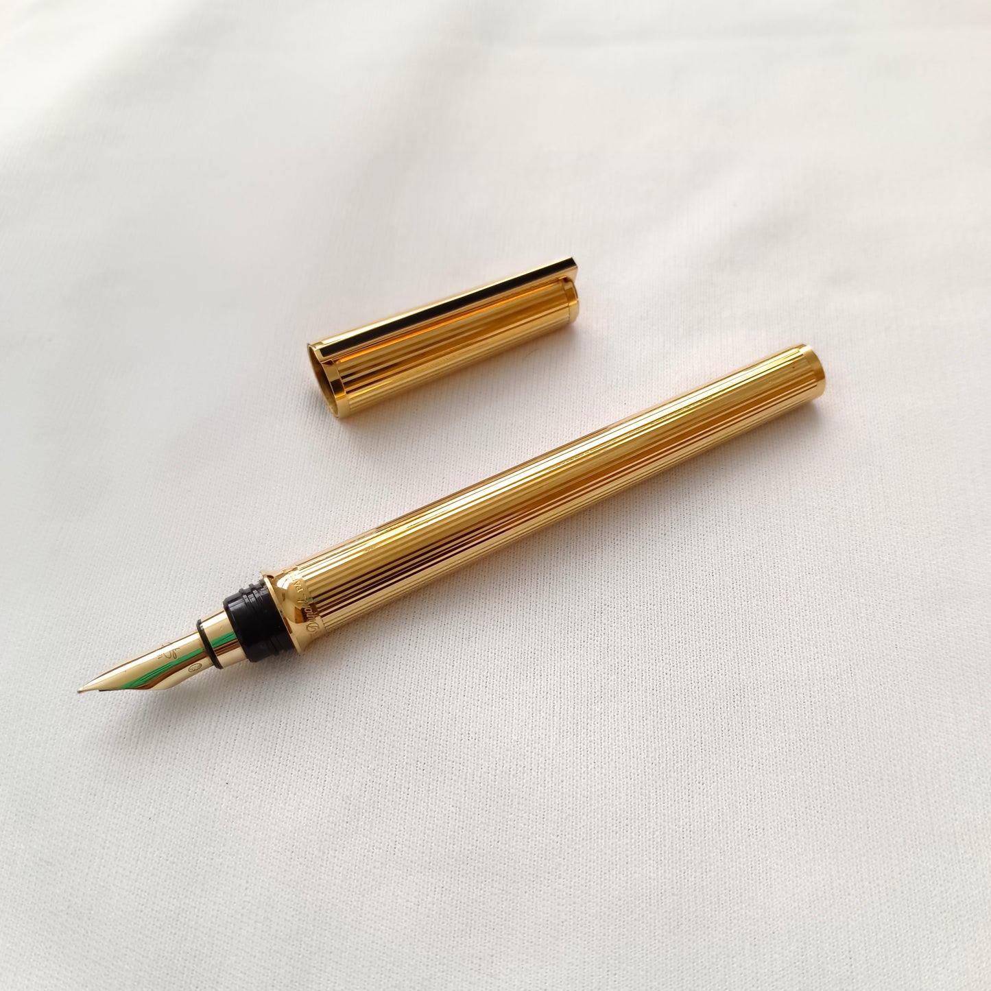 S.T. Dupont Montparnasse fountain pen gold plated guilloche 18kt gold nib