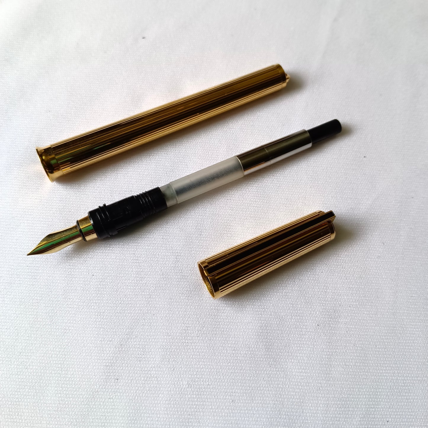 S.T. Dupont Montparnasse fountain pen gold plated guilloche 18kt gold nib
