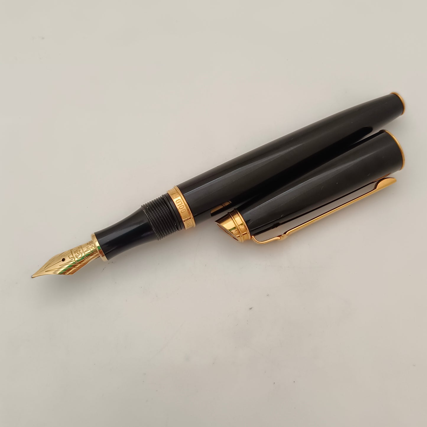 Caran d'Ache Geneve Black Fountain Pen - Gold Trim