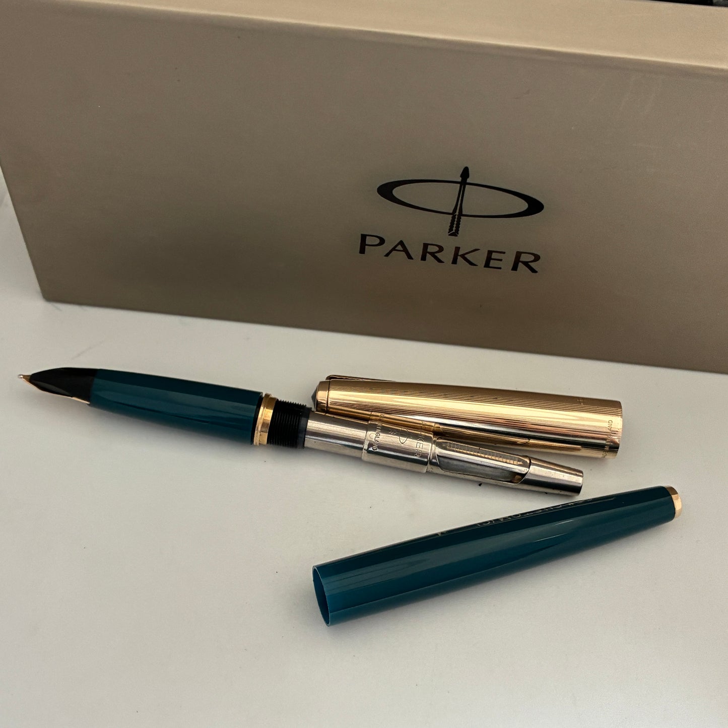 Parker 65 Custum Teal Blue Fountain Pen with Gold Filled Cap